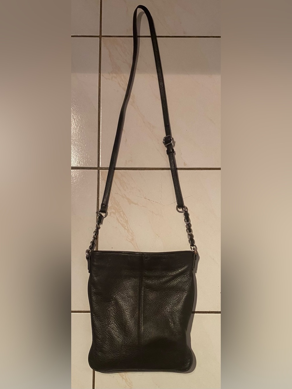 Vintage Danier Dark Brown Pebbled Leather
Crossbody Hobo Bag. - Picture 2 of 15